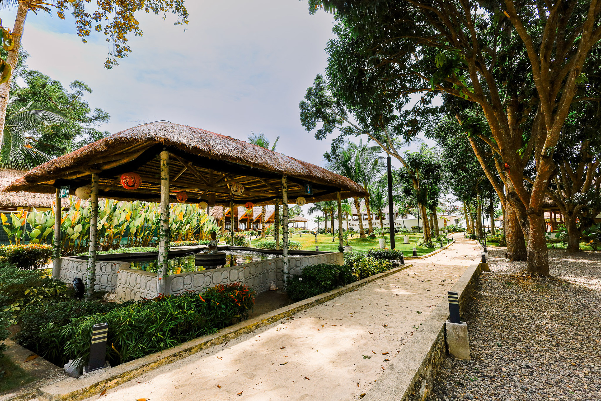 Tropical grounds and pavilion at Casa Verde Cliff Resort