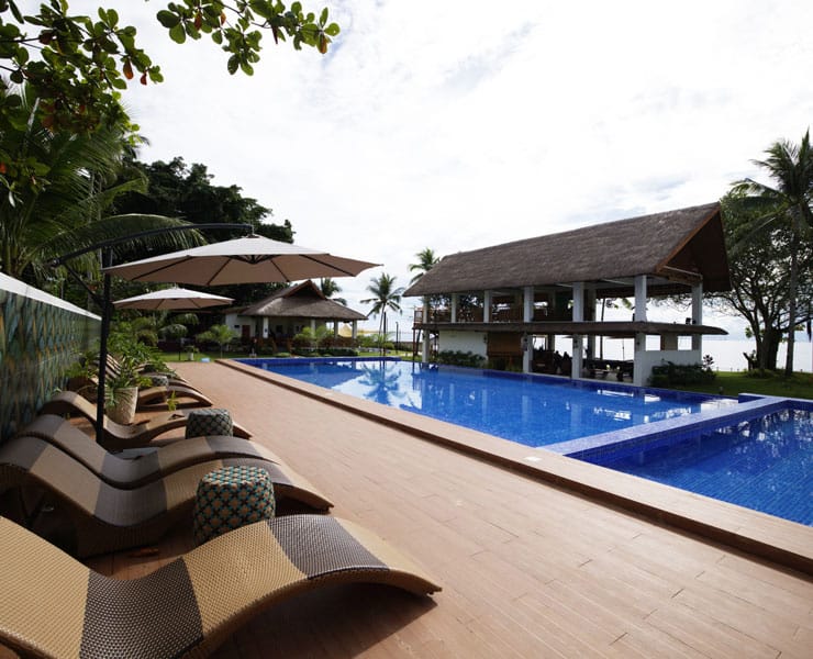 Pool area with cabanas