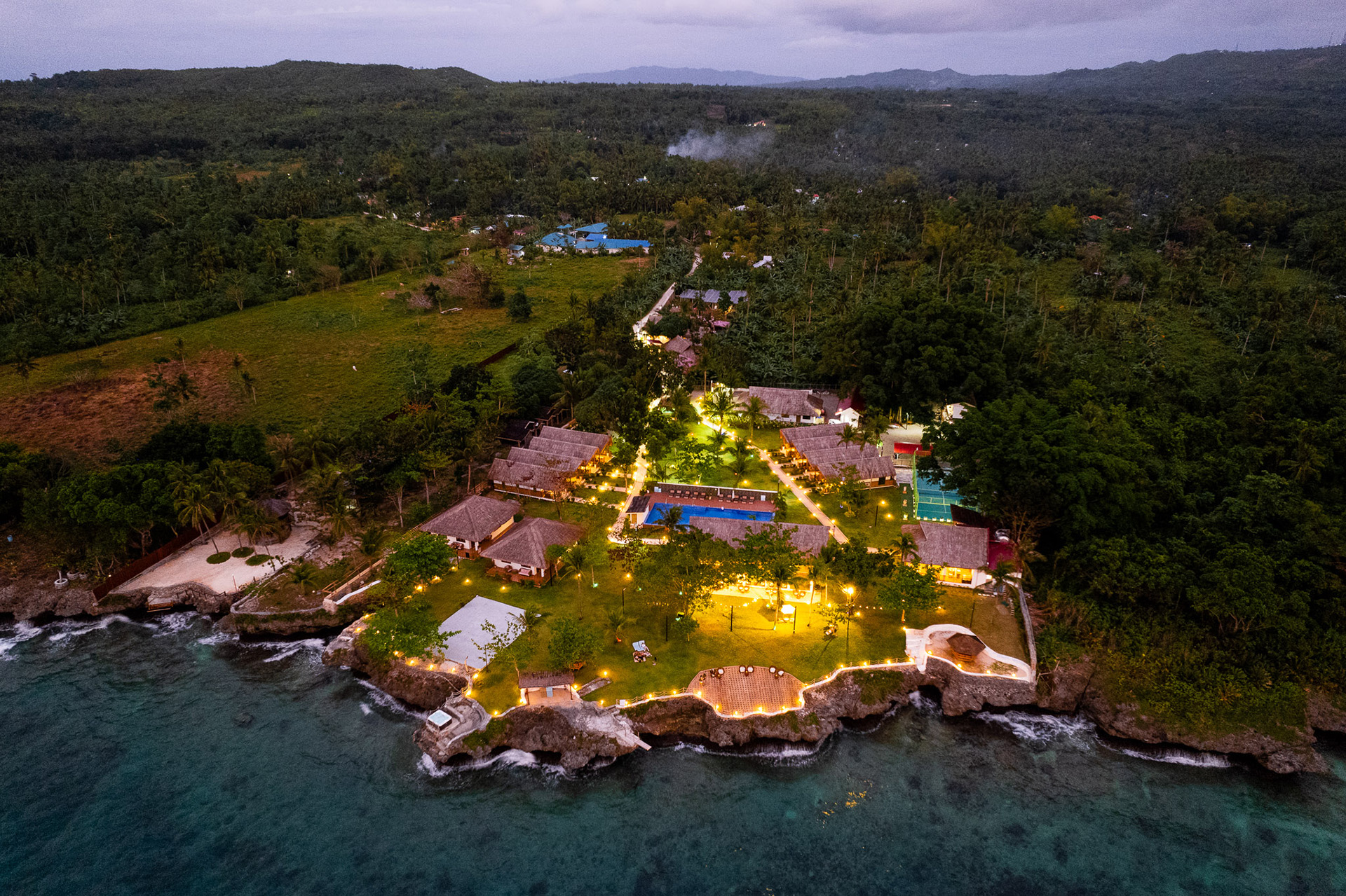 Drone photograph of the resort grounds and cliff edge